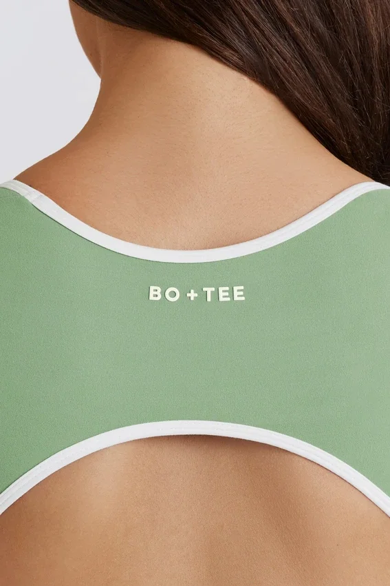Soft Active-helbody med öppen rygg i grönt Soft Active-helbody med öppen rygg i grönt