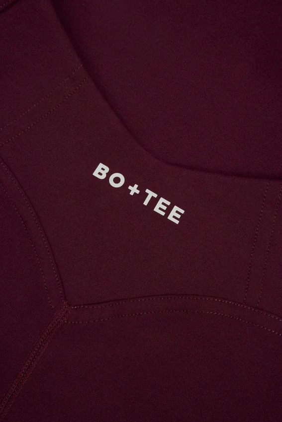 Soft Active-helkostym med öppen rygg i burgundy Soft Active-helkostym med öppen rygg i burgundy