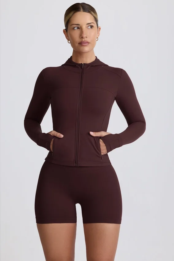 Soft Active-mellanlagerjacka med huva i chokladbrun Soft Active-mellanlagerjacka med huva i chokladbrun