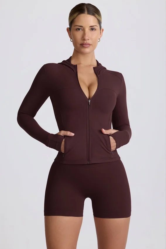 Soft Active-mellanlagerjacka med huva i chokladbrun Soft Active-mellanlagerjacka med huva i chokladbrun