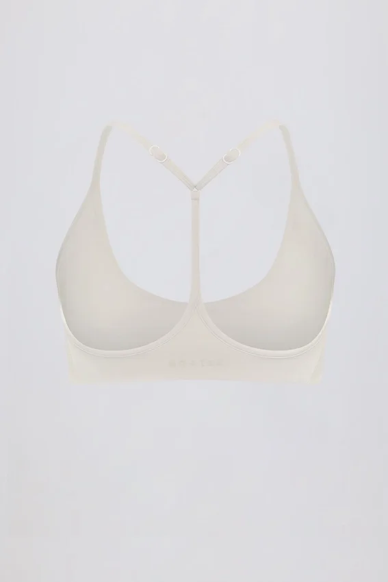 Soft Active-sport-BH med racerback i krämfärg Soft Active-sport-BH med racerback i krämfärg