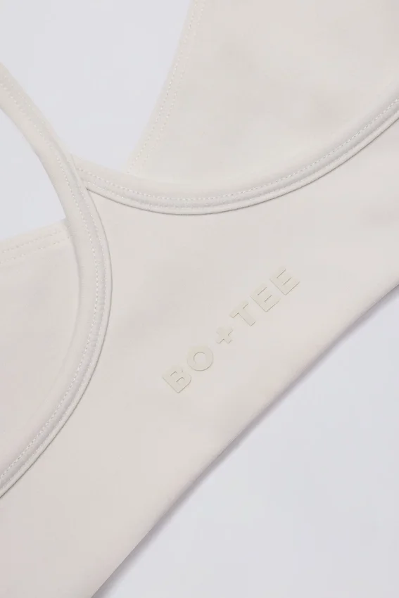 Soft Active-sport-BH med racerback i krämfärg Soft Active-sport-BH med racerback i krämfärg