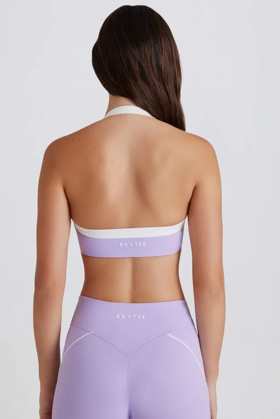 Soft Active sport-BH med vridet framsida och halterneck i lila Soft Active sport-BH med vridet framsida och halterneck i lila