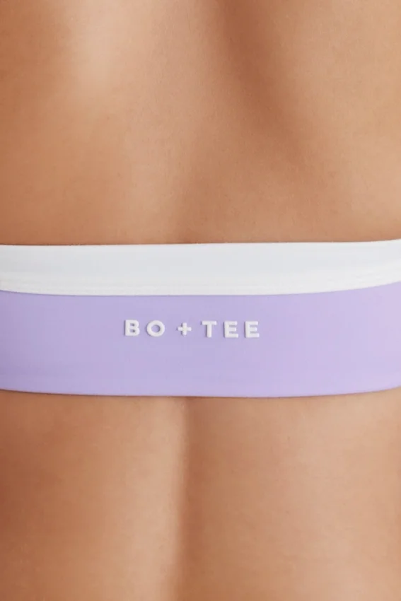 Soft Active sport-BH med vridet framsida och halterneck i lila Soft Active sport-BH med vridet framsida och halterneck i lila