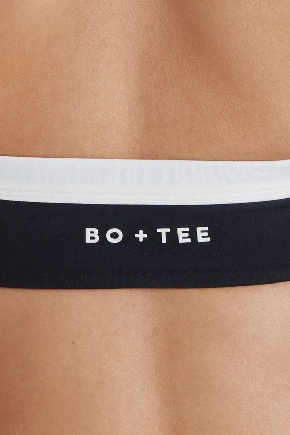 Soft Active sport-BH med vridet framsida och halterneck i svart Soft Active sport-BH med vridet framsida och halterneck i svart