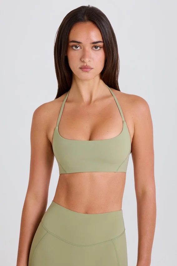 Sport-BH med rund halsringning och halterneck i färgen Matcha Sport-BH med rund halsringning och halterneck i färgen Matcha