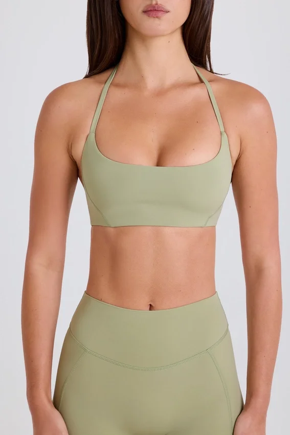 Sport-BH med rund halsringning och halterneck i färgen Matcha Sport-BH med rund halsringning och halterneck i färgen Matcha