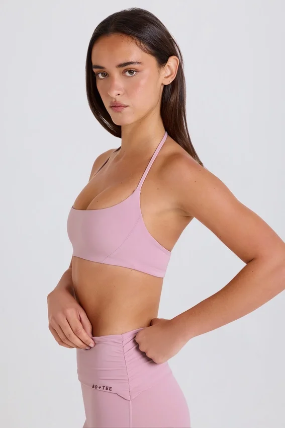 Sport-BH med rund halsringning och halterneck i mauve Sport-BH med rund halsringning och halterneck i mauve