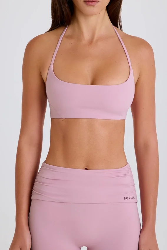 Sport-BH med rund halsringning och halterneck i mauve Sport-BH med rund halsringning och halterneck i mauve