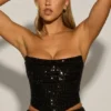 Sterling Embellished Draped Corset Top i svart Sterling Embellished Draped Corset Top i svart