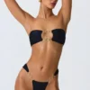 Sunny Isles Bandeau-bikinitopp med utskärningar och dekorationer i svart Sunny Isles Bandeau-bikinitopp med utskärningar och dekorationer i svart