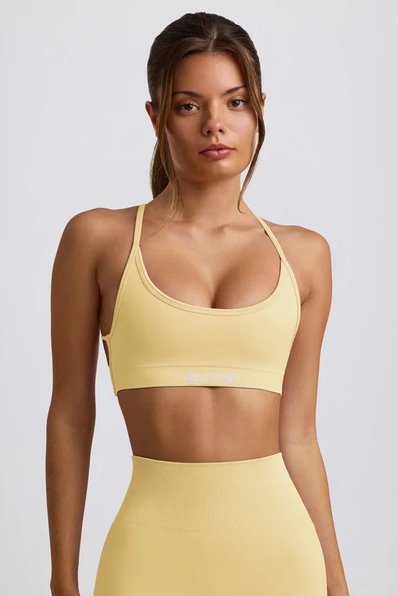 Super Sculpt sömlös rygglös sport-BH i smörgul Super Sculpt sömlös rygglös sport-BH i smörgul