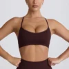 Super Sculpt sömlös sport-BH med korsad rygg i choklad Super Sculpt sömlös sport-BH med korsad rygg i choklad