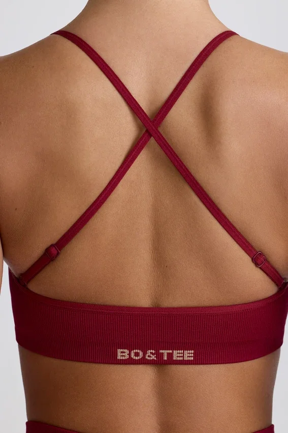 Super Sculpt sömlös sport-BH med korsade band i ryggen i burgundy Super Sculpt sömlös sport-BH med korsade band i ryggen i burgundy