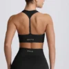 Super Sculpt sömlös sport-BH med T-rygg i svart Super Sculpt sömlös sport-BH med T-rygg i svart