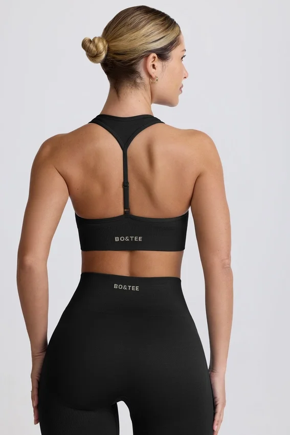 Super Sculpt sömlös sport-BH med T-rygg i svart Super Sculpt sömlös sport-BH med T-rygg i svart