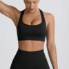 Super Sculpt sömlös sport-BH med T-rygg i svart Super Sculpt sömlös sport-BH med T-rygg i svart