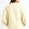 Sweatshirt med kvartslås i benvit Sweatshirt med kvartslås i benvit