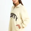 Sweatshirt med kvartslås i benvit Sweatshirt med kvartslås i benvit
