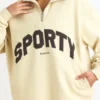 Sweatshirt med kvartslås i benvit Sweatshirt med kvartslås i benvit
