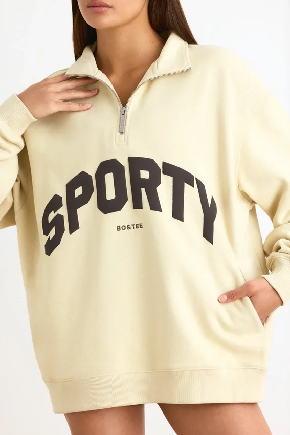 Sweatshirt med kvartslås i benvit Sweatshirt med kvartslås i benvit