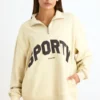 Sweatshirt med kvartslås i benvit Sweatshirt med kvartslås i benvit