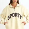 Sweatshirt med kvartslås i benvit Sweatshirt med kvartslås i benvit