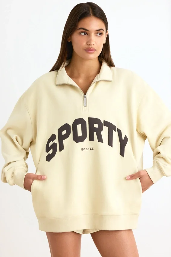 Sweatshirt med kvartslås i benvit Sweatshirt med kvartslås i benvit