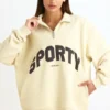 Sweatshirt med kvartslås i benvit Sweatshirt med kvartslås i benvit