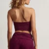 Tarni bandeau-crop-top med metalldetaljer i bärlila Tarni bandeau-crop-top med metalldetaljer i bärlila