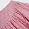 Thia minikjol med rosettdetaljer i broderie anglaise i mjukrosa Thia minikjol med rosettdetaljer i broderie anglaise i mjukrosa
