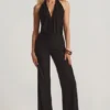 Tulay Devoré jumpsuit med halterneck och öppen rygg i svart Tulay Devoré jumpsuit med halterneck och öppen rygg i svart