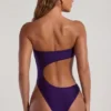Tulum bandeau-baddräkt med utskärningar och pärlbroderier i mörklila Tulum bandeau-baddräkt med utskärningar och pärlbroderier i mörklila