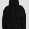 Vattentät, kort oversized skidjacka i svart leopardmönster Vattentät, kort oversized skidjacka i svart leopardmönster