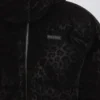 Vattentät, kort oversized skidjacka i svart leopardmönster Vattentät, kort oversized skidjacka i svart leopardmönster