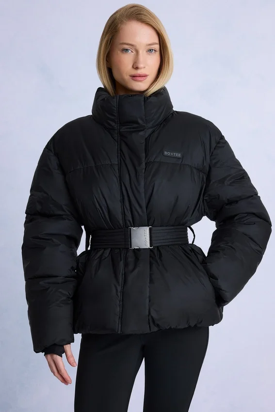 Vattentät oversized skidjacka med bälte i svart Vattentät oversized skidjacka med bälte i svart
