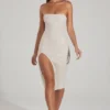 Verbier Midi-klänning med bandeau-top och cowl-hals i elfenben Verbier Midi-klänning med bandeau-top och cowl-hals i elfenben