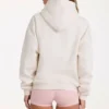 Överdimensionerad hoodie med applikation i elfenben Överdimensionerad hoodie med applikation i elfenben