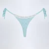 Vernazza bikinibyxor med snörning i sidorna i broderie anglaise i puderblått Vernazza bikinibyxor med snörning i sidorna i broderie anglaise i puderblått