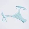 Vernazza bikinibyxor med snörning i sidorna i broderie anglaise i puderblått Vernazza bikinibyxor med snörning i sidorna i broderie anglaise i puderblått