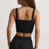 Yolanda Pointelle-Knit Crop Top i svart Yolanda Pointelle-Knit Crop Top i svart
