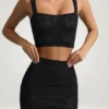 Yolanda Pointelle-Knit Crop Top i svart Yolanda Pointelle-Knit Crop Top i svart