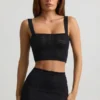 Yolanda Pointelle-Knit Crop Top i svart Yolanda Pointelle-Knit Crop Top i svart