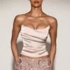Yulea Satin Draped Lace-Up Corset Top i guld Yulea Satin Draped Lace-Up Corset Top i guld