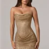 Zara Miniklänning med bandeau-top och draperad midja i guld Zara Miniklänning med bandeau-top och draperad midja i guld