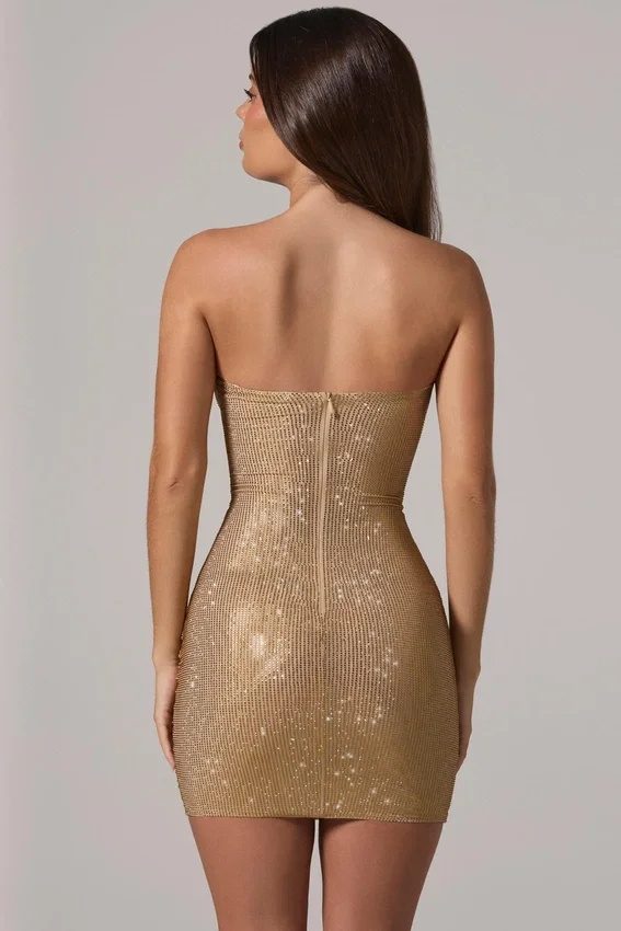 Zara Miniklänning med bandeau-top och draperad midja i guld Zara Miniklänning med bandeau-top och draperad midja i guld
