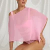 Zarayah genomskinlig poncho i Candyfloss Pink Zarayah genomskinlig poncho i Candyfloss Pink