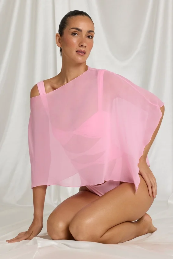 Zarayah genomskinlig poncho i Candyfloss Pink Zarayah genomskinlig poncho i Candyfloss Pink