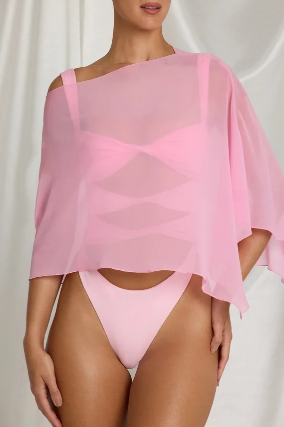 Zarayah genomskinlig poncho i Candyfloss Pink Zarayah genomskinlig poncho i Candyfloss Pink
