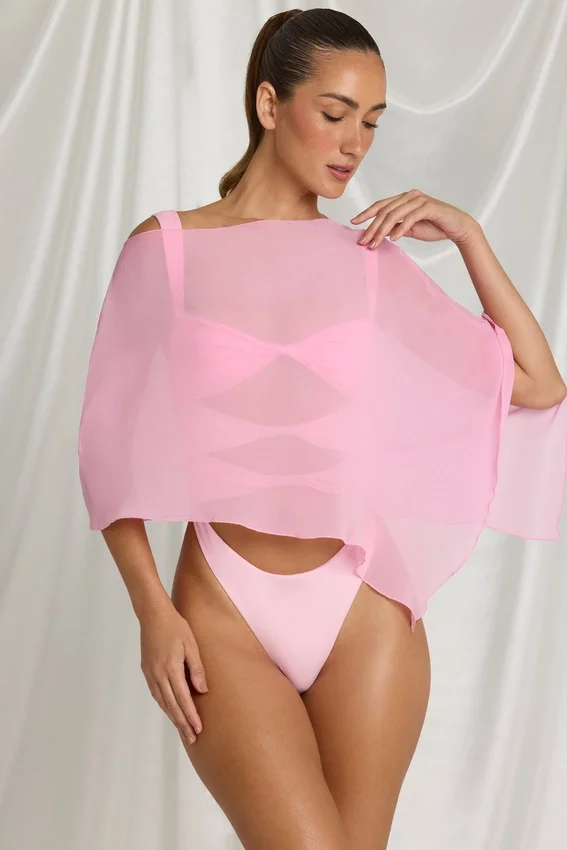 Zarayah genomskinlig poncho i Candyfloss Pink Zarayah genomskinlig poncho i Candyfloss Pink